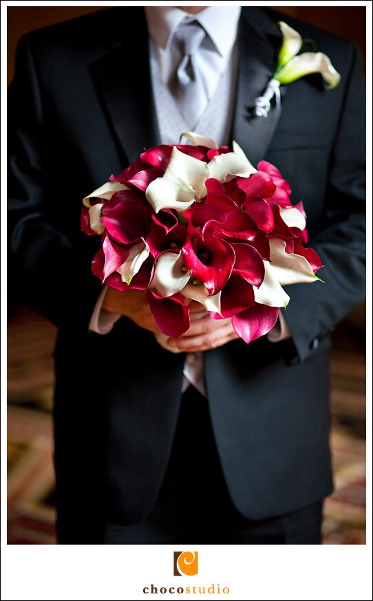 Groom holding bouquet